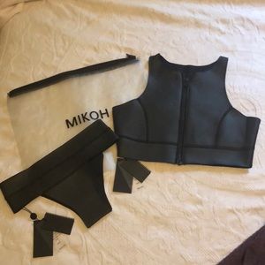 Two Mikoh neoprean suits